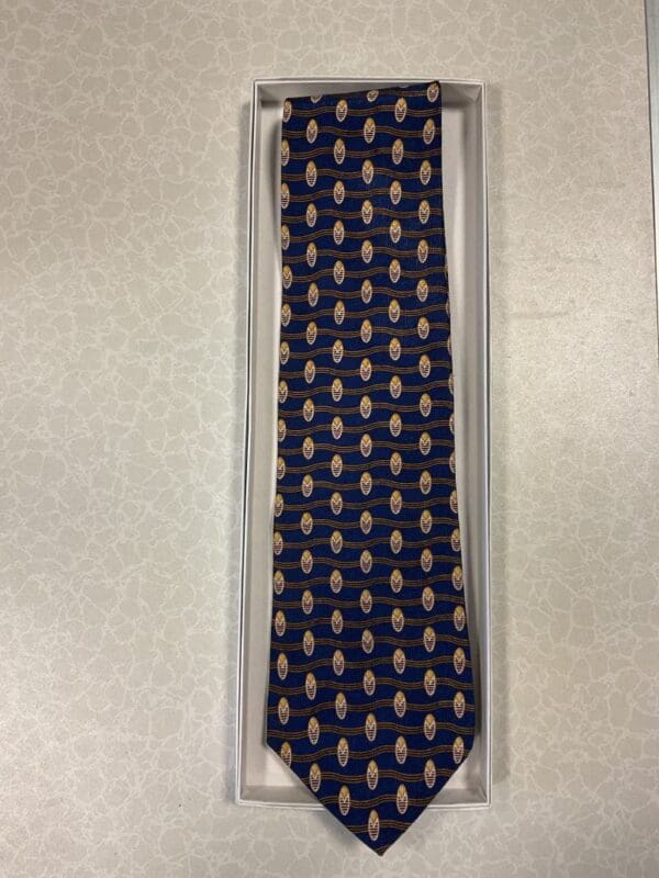 A tie that is in its box.