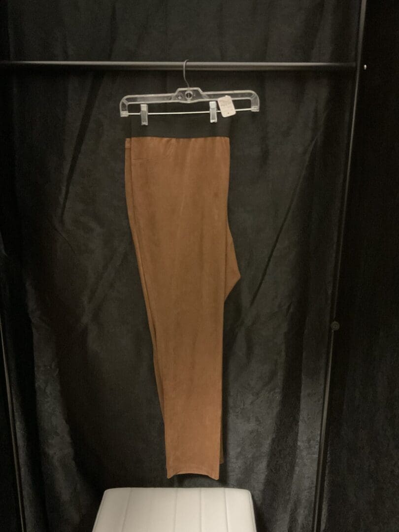 A wooden board hanging on the wall