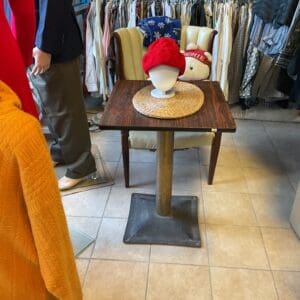 A table with a bowl on top of it